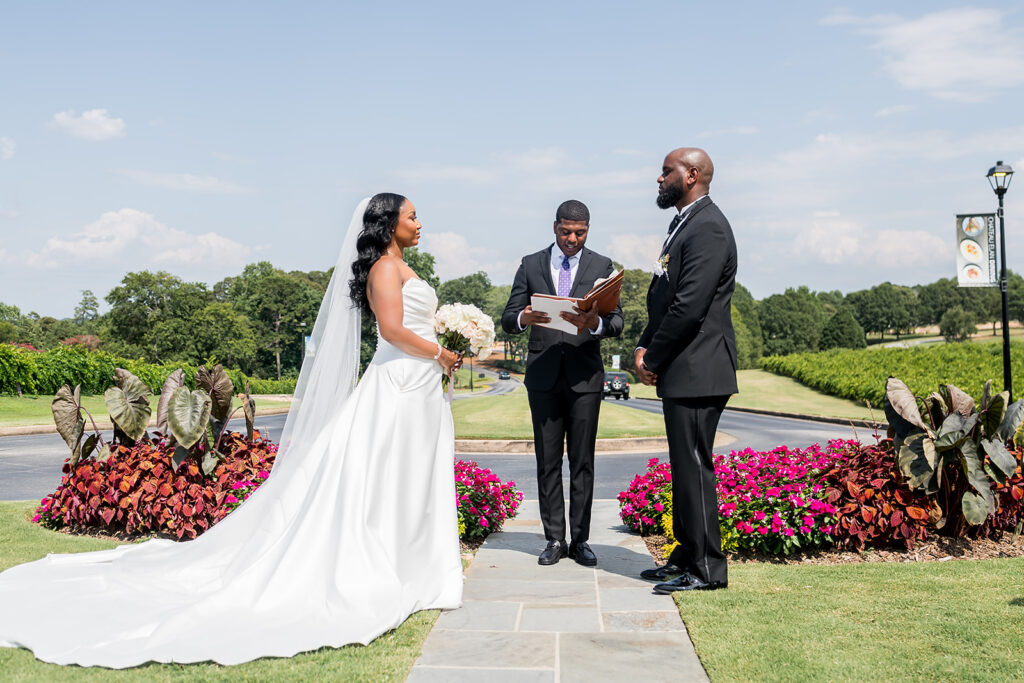 Elopement at Chateau Elan Winery captured by JAM&CO Studios Atlanta Elopement photographer Bride and groom at alter