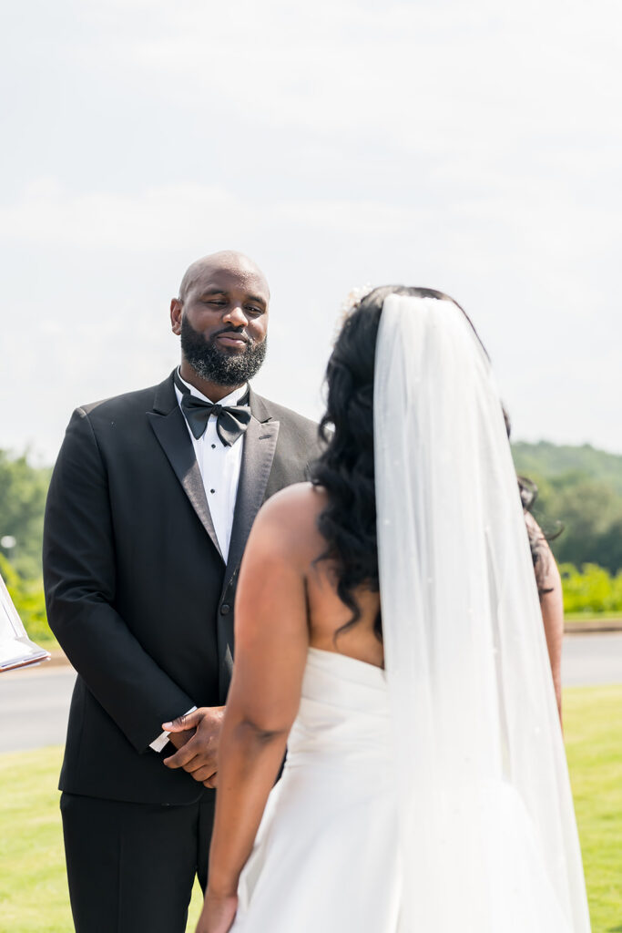 Elopement at Chateau Elan Winery captured by JAM&CO Studios Atlanta Elopement photographer groom looking at bride