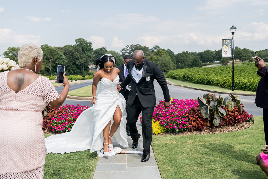 Elopement at Chateau Elan Winery captured by JAM&CO Studios Atlanta Elopement photographer couple jumping the broom