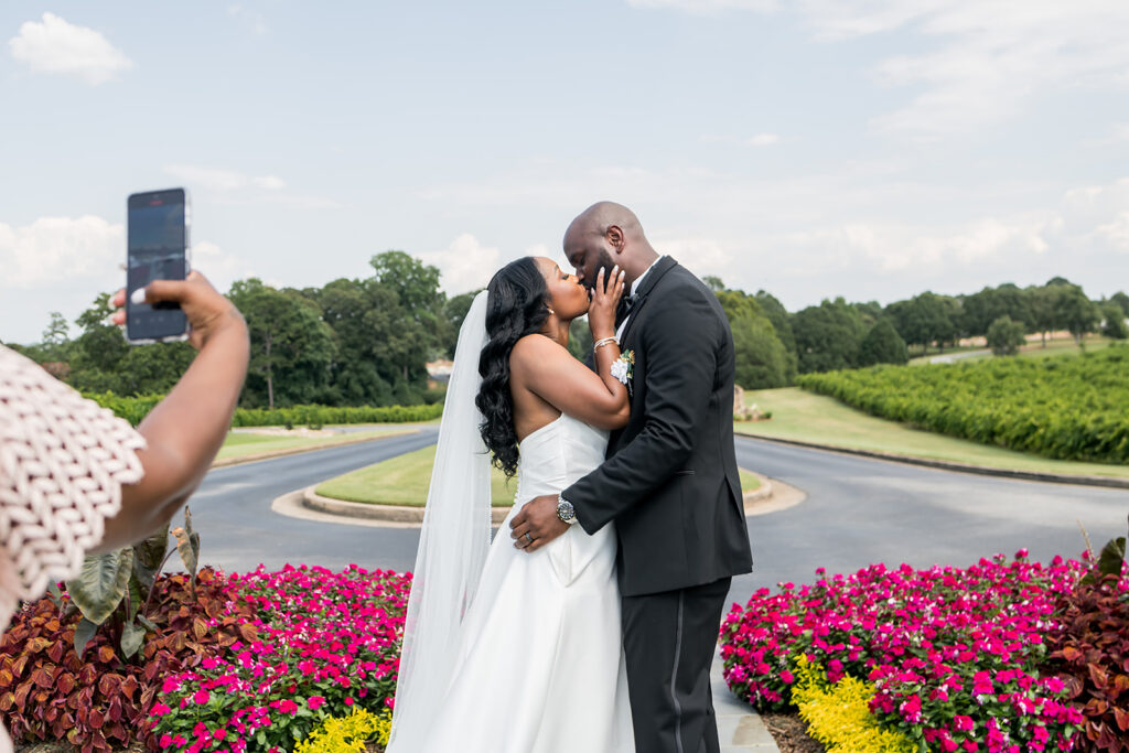 Elopement at Chateau Elan Winery captured by JAM&CO Studios Atlanta Elopement photographer bride and groom kissing