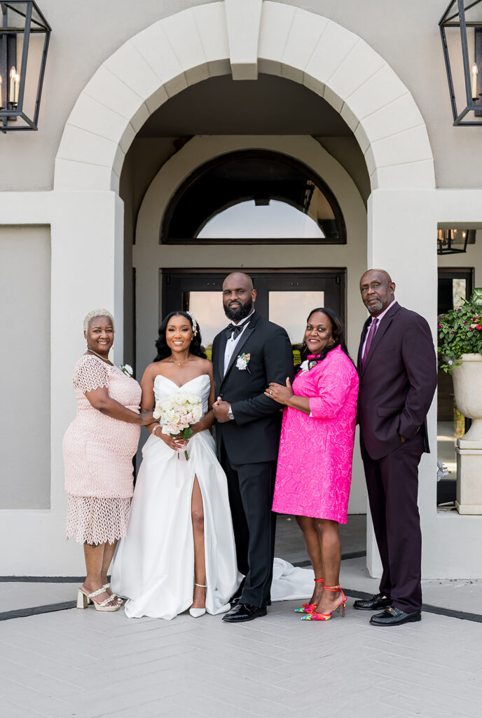 Elopement at Chateau Elan Winery captured by JAM&CO Studios Atlanta Elopement photographer Bride and groom with their parents