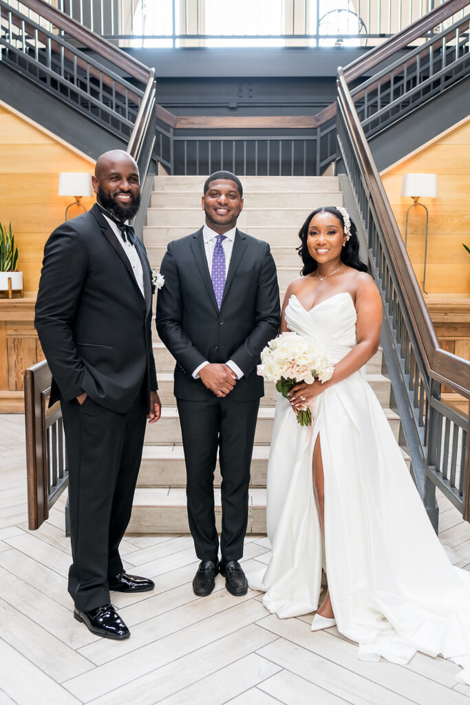Elopement at Chateau Elan Winery captured by JAM&CO Studios Atlanta Elopement photographer bride and groom with wedding officiant