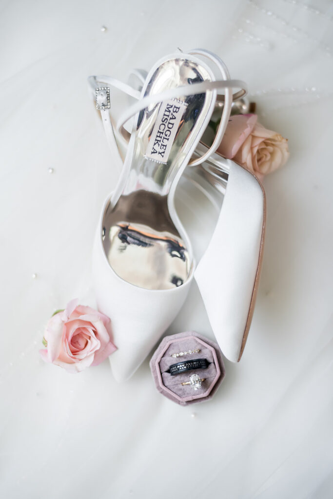 Elopement at Chateau Elan Winery brides shoes and rings with flowers captured by JAM&CO Studios