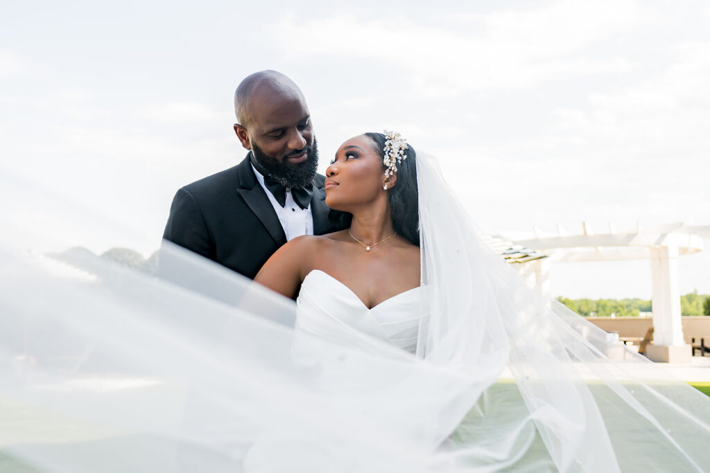 Elopement at Chateau Elan Winery captured by JAM&CO Studios Atlanta Elopement photographer Bride and groom veil swoosh photo