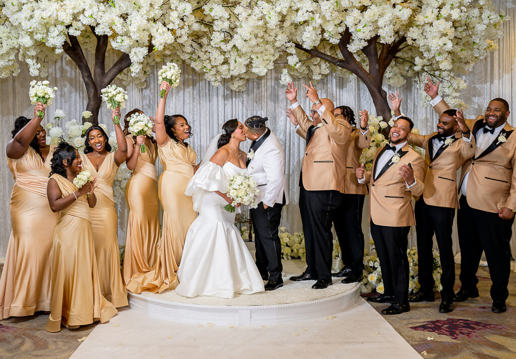 The Whitley Hotel Wedding captured by JAM&CO Studios wedding photo and video team bride and groom with bridal party photo