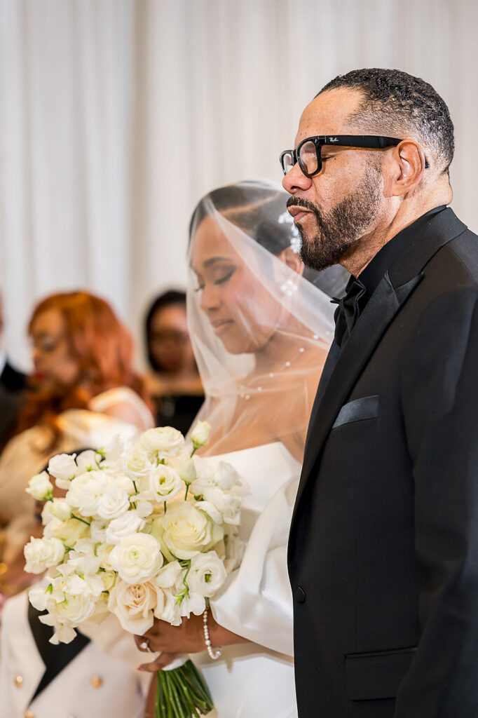 The Whitley Hotel Wedding captured by JAM&CO Studios wedding photo and video team Bride with father at the ceremony