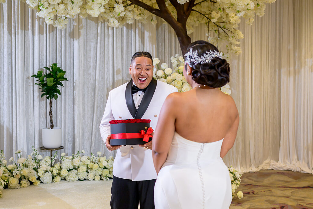 The Whitley Hotel Wedding captured by JAM&CO Studios wedding photo and video team groom first look with bride