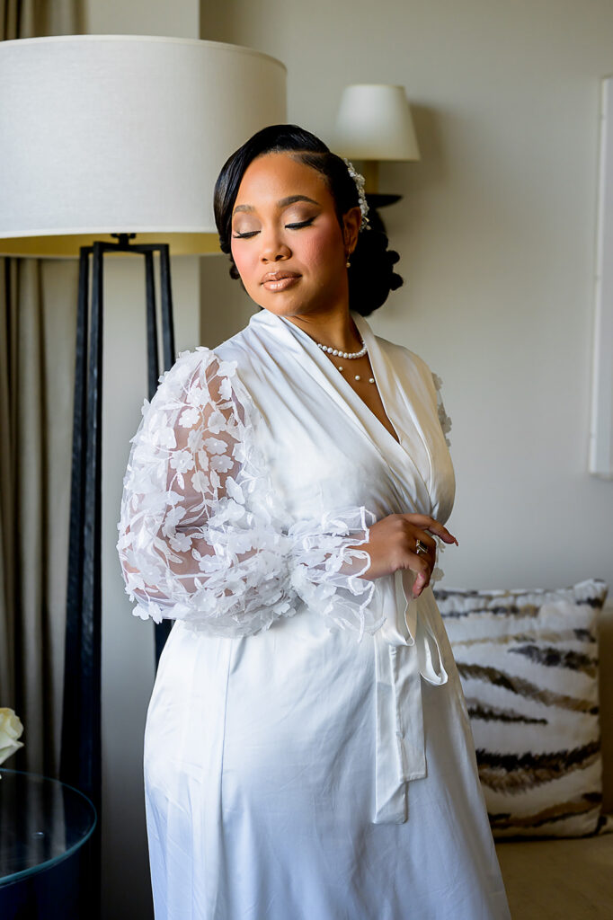 The Whitley Hotel Wedding captured by JAM&CO Studios wedding photo and video team bride in bridal robe