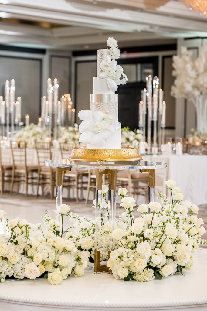 The Whitley Hotel Wedding captured by JAM&CO Studios wedding photo and video team Wedding cake in reception space