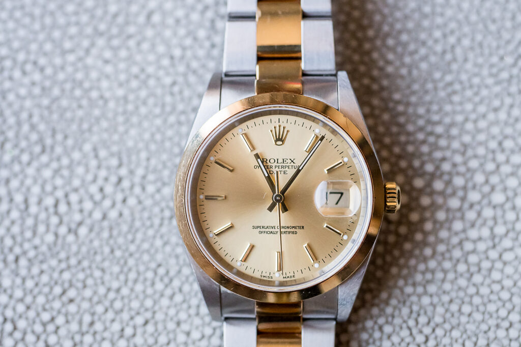 The Whitley Hotel Wedding captured by JAM&CO Studios wedding photo and video team grooms rolex watch